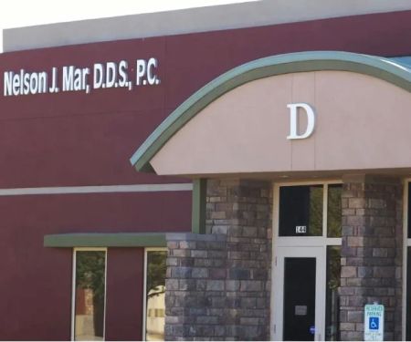 Nelson J. Mar D.D.S., F.A.G.D.