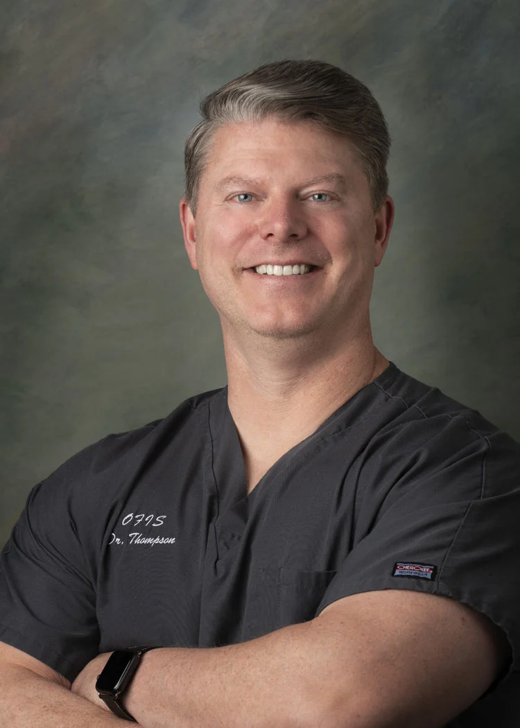 Dr. J. Travis Thompson, DDS 1