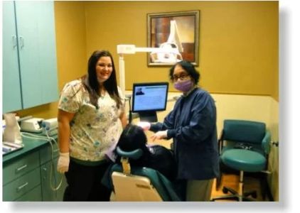 Merchant Dental: Dr. Merchant and Dr. Merchant