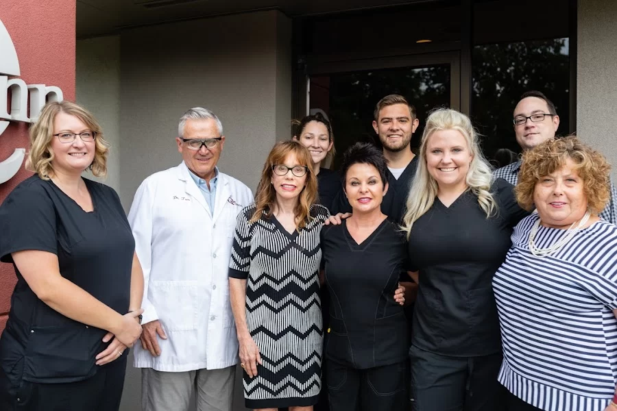 Thomas L. Quinn, DDS 7
