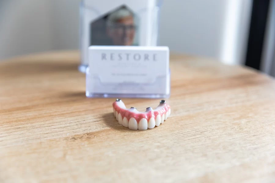 Restore Denture and Implant Center: Dr. Alyssa Mencini, DMD 4