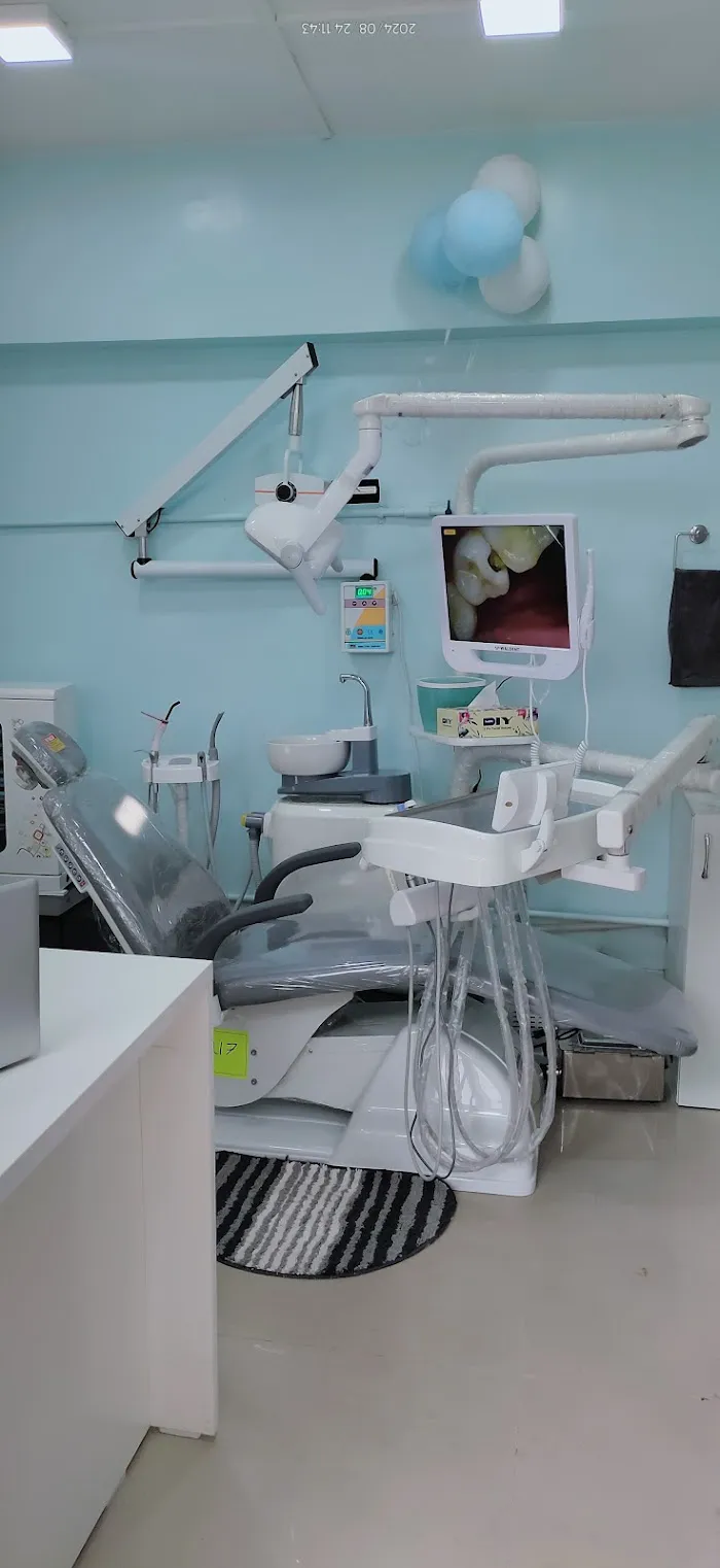 Dr.Bade HappyDent Dental Clinic - Best dental clinic in Tathawade for root canal or RCT dental implant Dentist in Tathawade 1